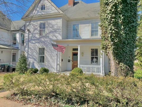 Exterior- house sits on a safe, residential street just minutes from the historic Downtown business district! The porch is a great place for coffee or cocktail chats and there are always plenty of dog walkers/runners/cyclists going by!