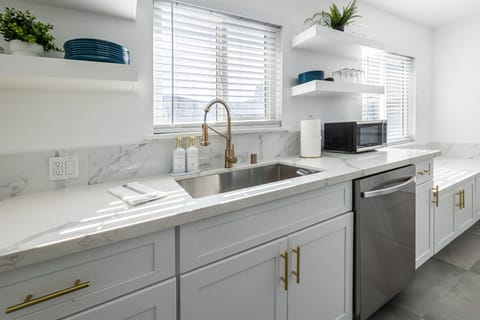 Kitchen: Fully equipped, sunlit kitchen perfect for favorite recipes.