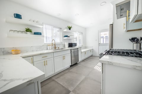 Kitchen: Fully equipped, sunlit kitchen perfect for favorite recipes.