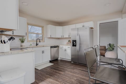 Fully Stocked Kitchen with Dining Bar