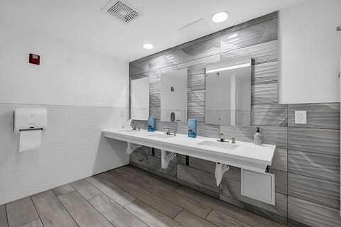 Get ready smoothly with wide counters and bright mirrors.