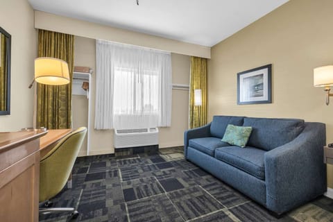 Work, relax, and enjoy daylight from the cozy seating area.