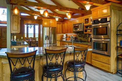 Kitchen island with bar stools