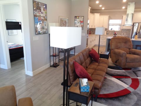 Kitchen area upper right, guest bedroom entrance to left.