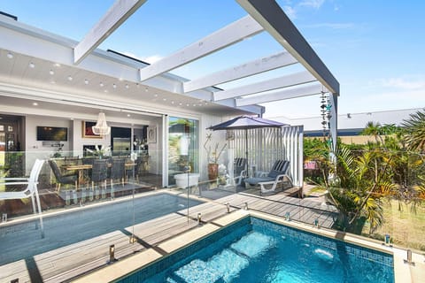 Cool off in the sparkling backyard pool.