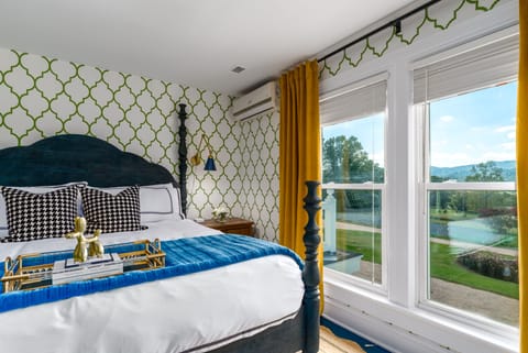 Suite 10: King Anthropologie Bed, stunning views of mountains from all windows, porcelain tile bath with a jacuzzi tub that will have a 360 curtain and shower attachment, 55" Smart TV and no walls adjoin with other suites or living areas