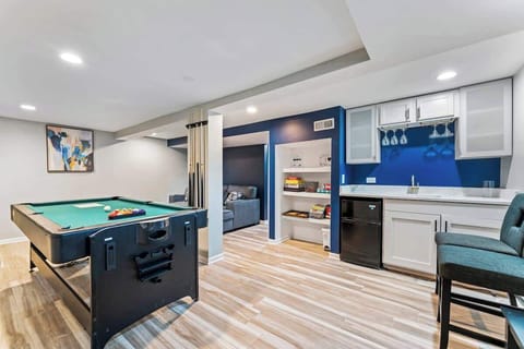 Relax & enjoy the pool table, Air hockey and board games with the family. Have a drink at the wet bar.