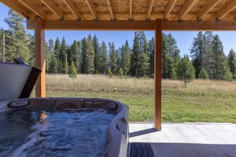 Covered outdoor hot tub, beautiful surroundings