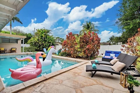 Stay between Miami and Fort Lauderdale with easy access to Hard Rock Stadium.
- Private pool with flamingo and unicorn float inflatables  
- Lounge chairs with fresh towels set for sunny afternoons  
- A tropical retreat  
