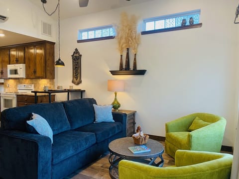 The sleeper sofa faces the lake and the cute pub chairs swivel 360*