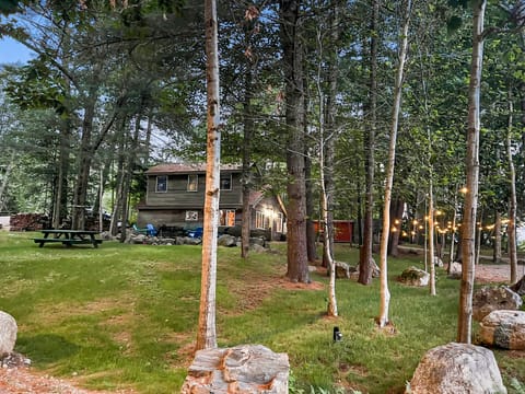 Exterior picture of the house in the middle of the woods