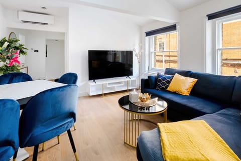 This living room stands as a testament to the fusion of grandeur and comfort, inviting you to embark on a journey through a space that seamlessly blends opulent aesthetics with the warmth of a home. From the richly upholstered furniture to the artful play of colors and patterns, every corner is an invitation to experience the true essence of luxurious living
