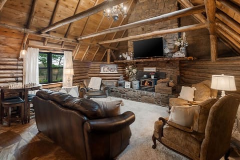 Awesome living room with vaulted ceilings and rock fireplace!