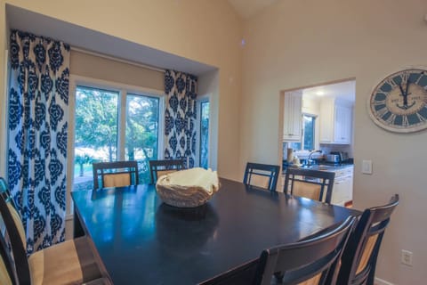 Happy Place features a large dining table that comfortably seats 8.