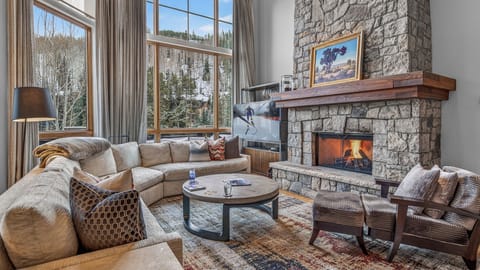 Great Room, Main Level - With stone fireplace