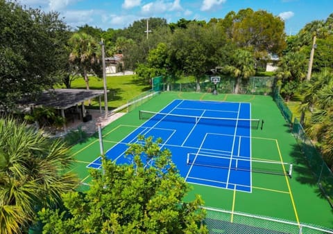 Multi sport court. Play one or more sports at the same time.  Tennis, Pickleball or Basketball. 