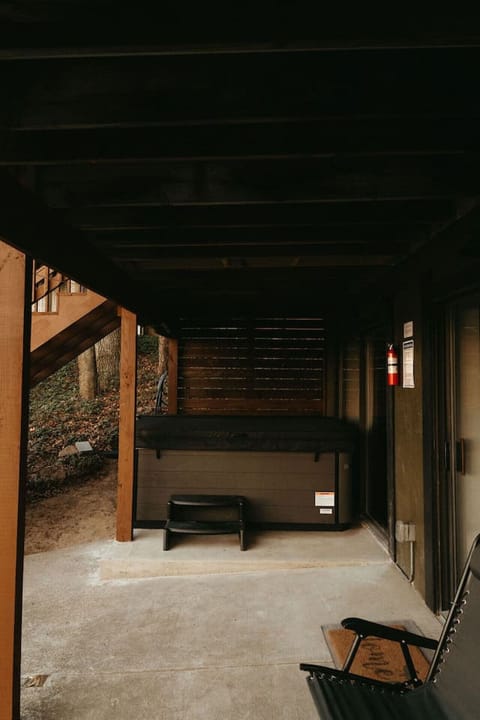 Outdoor hot tub with sheltered seating