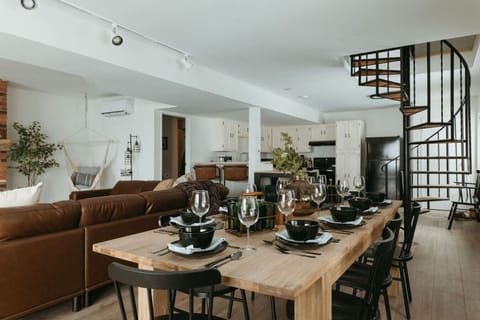 Stylish dining area connected to living room