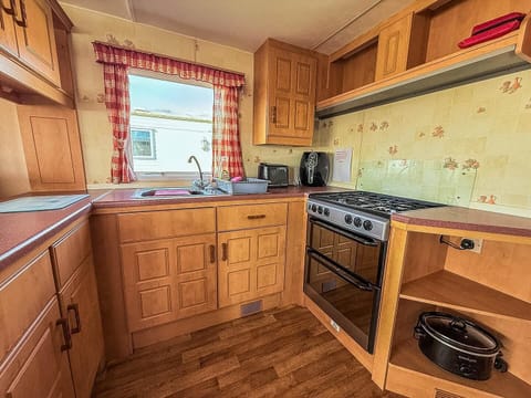 The kitchen transforms your caravan into a true home away from home, ensuring your break is as practical as it is memorable.