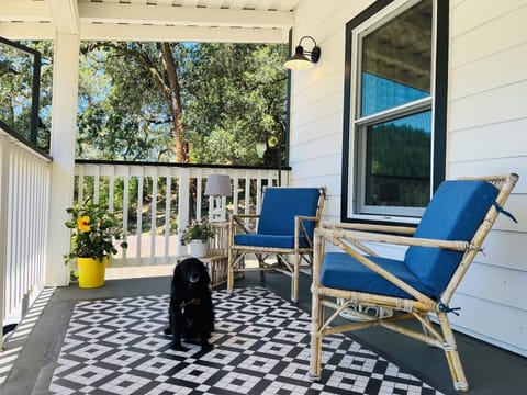 Upper-level covered porch, nice rain or shine.