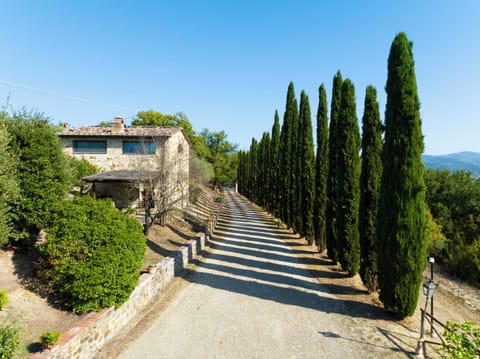 Gated entranceway with guesthouse