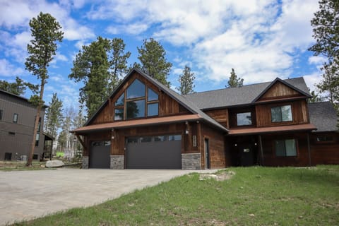Large 3 car garage and driveway for additional parking