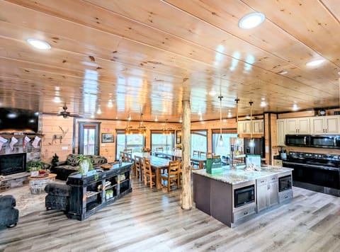 Main level: Nicely flowing living area, dining, kitchen with plenty of light. 