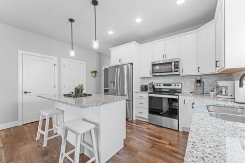 Full Kitchen with Major Appliances & Bar Seating