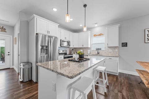 Full Kitchen with Major Appliances & Bar Seating
