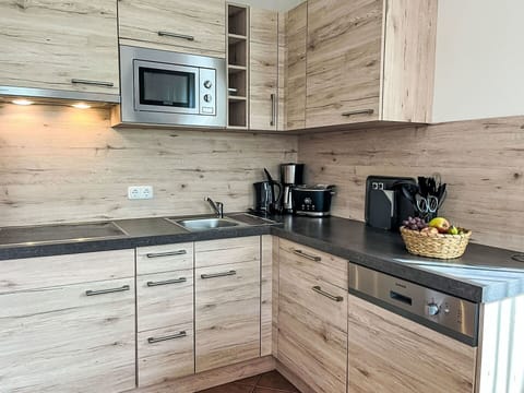 Cabinetry, Wood, Flooring, Countertop, Furniture, Kitchen, Drawer, Kitchen Appliance, Interior Design, Floor