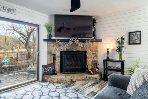 Perfect view from the living room of the Little River- excellent placement of the 65” tv to watch the game.m