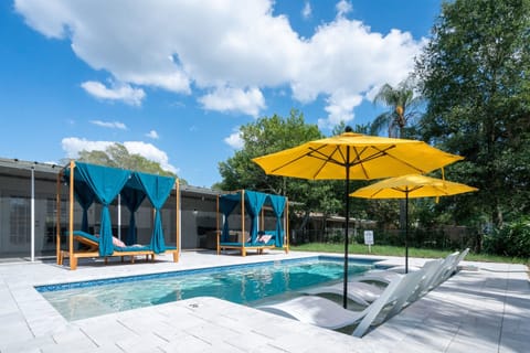 Enjoy resort-style living with a gorgeous heated saltwater pool. Cabanas and sun loungers provide plenty of seating options.