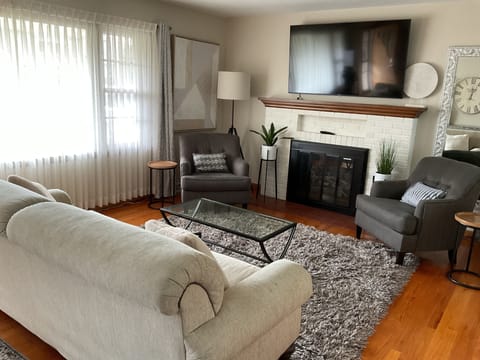 Large Living Room with 65 inch Smart TV perfect for family gatherings