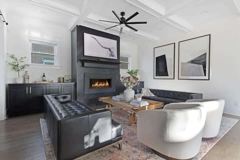 Warm Living Room with Fireplace and Comfortable Sofas