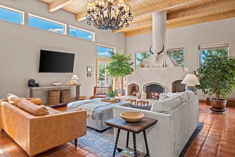 Beautiful main living room with wood-burning, showcase, fireplace!