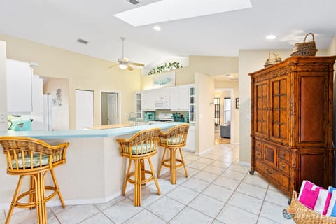 Fully-Equipped Kitchen with Bar Seating
