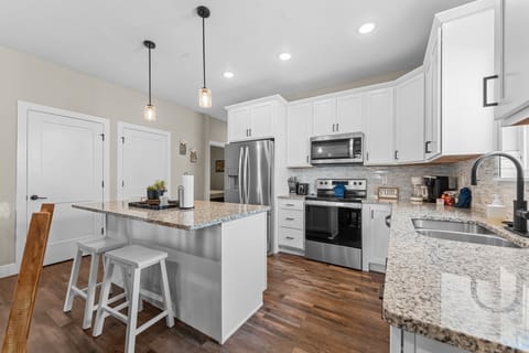 Full Kitchen with Major Appliances & Bar Seating