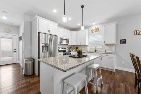 Full Kitchen with Major Appliances & Bar Seating