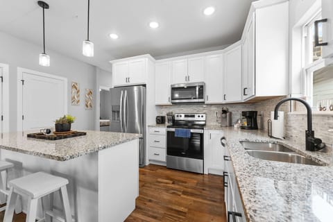 Full Kitchen with Major Appliances & Bar Seating