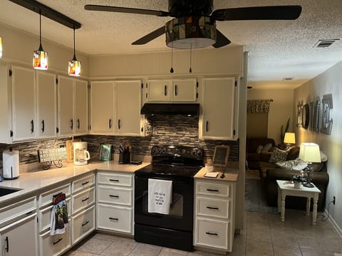 Kitchen, opens to living Area