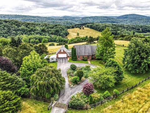 Scenic Hilltop House at 1700 feet on 105 beautiful acres.