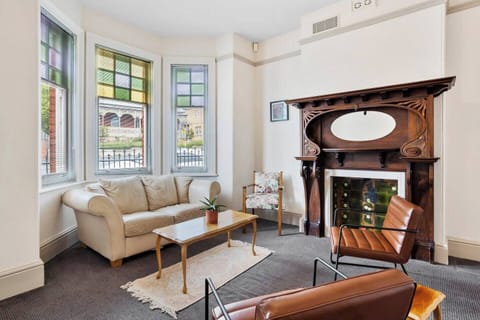 Unwind in the downstairs living room, designed with comfort in mind. 