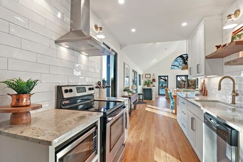 Fully equipped kitchen with electric stove