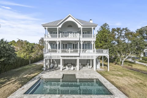 Exterior pool, bayou, and river views