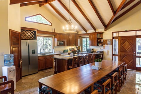 Dining area & kitchen, natural light from three directions, cathedral ceiling!