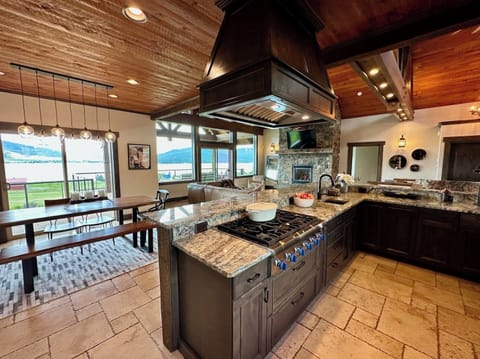 Enjoy meals at the dining room table where you can comfortably seat 7-8 and the 5-stool raised counter. Or take your meals outside to enjoy on the deck.