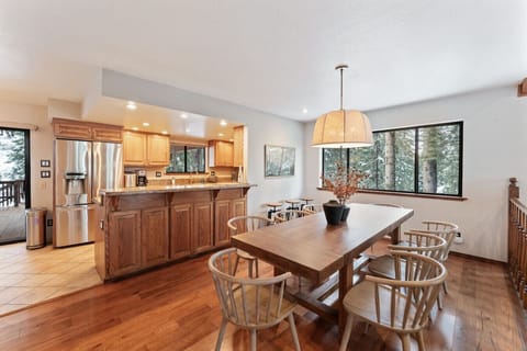 Fully stocked kitchen with access to upper back deck (furniture and ping pong table in the summer)