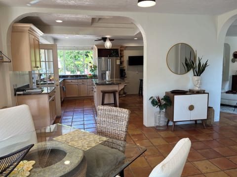 Dining room looking into kitchen and living room.