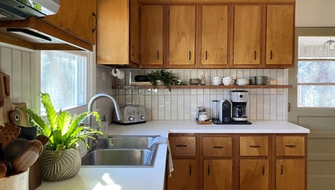 Coffee, Tea, Matcha, Hot Chocolate... We've got you covered! Help yourself to the Nespresso machine, coffee pot, Chemex, electric frother, and tea kettle. Local coffee, tea, matcha, sugar, and creamers provided.