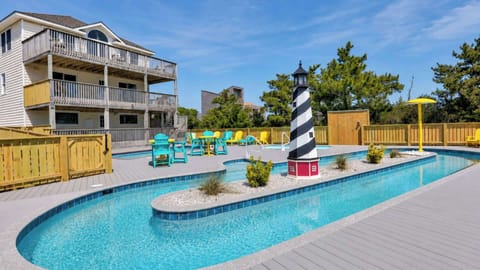 An oceanfront home built around its own private backyard water park.